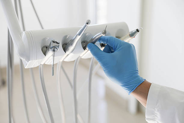Professional Tooth Extraction technician working in Oak Ridge, TN